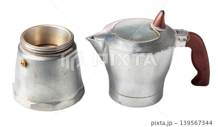 A classic Italian aluminium moka pot isolated on a white background. A classic Italian aluminium moka pot isolated on a white background. 139567344