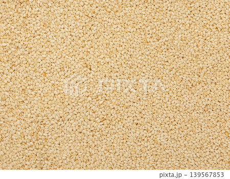 Sesame seeds pile textured background Sesame seeds pile textured background 139567853