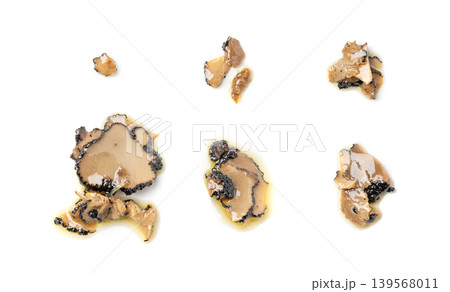 Truffle Slices Isolated, Tuber Melanosporum Mushroom Pieces in Oil, Canned Black Truffle 139568011