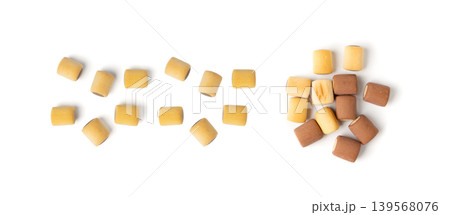 Filled dog biscuits, crackers isolated, soft crunchy pet treats pile, flavored small canine cookie 139568076