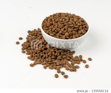 Dry pet food, dog kibble pile, puppy pellets, small canine protein croquette meal, animal food 139568118