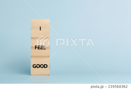 Wooden cubes with inscriptions I Feel Good on a blue background 139568362