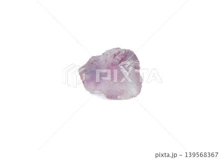 Amethyst mineral stone macro on white background Amethyst mineral stone macro on white background 139568367