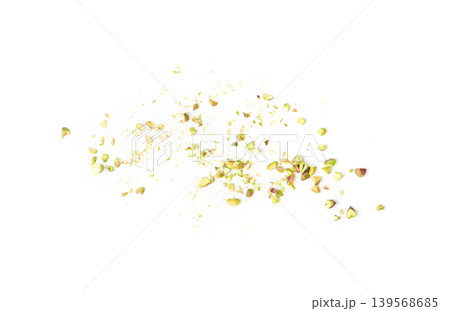 Fried salt pistachio nuts isolated. Baked pistachios pile, roasted green pistache fruits on white 139568685