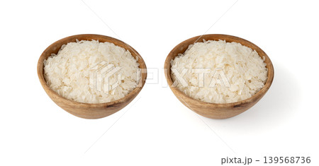 Raw flattened rice isolated. Dry rice flakes or poha, Indian breakfast food Raw flattened rice isolated. Dry rice flakes or poha, Indian breakfast food 139568736