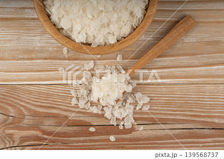 Raw flattened rice. Dry rice flakes or poha, Indian breakfast food 139568737