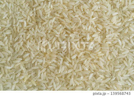White rice grains texture background White rice grains texture background 139568743