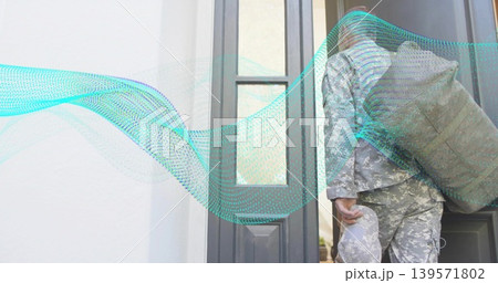 Carrying duffel bag, mature soldier in camo and boots entering doorway, teal wave, copy space Carrying duffel bag, mature soldier in camo and boots entering doorway, teal wave, copy space 139571802