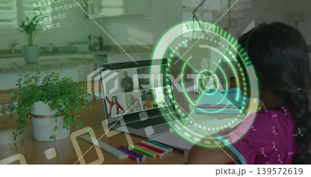 Sitting student pink-top focusing on laptop at home table, markers, plant, stairs, HUD, copy space Sitting student pink-top focusing on laptop at home table, markers, plant, stairs, HUD, copy space 139572619