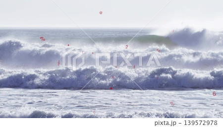 Rolling large ocean waves crashing toward shore along coastline, with white foam and spray Rolling large ocean waves crashing toward shore along coastline, with white foam and spray 139572978