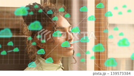 Standing female in pale green zip-up top closing eyes by wooden window, showing green cloud overlay Standing female in pale green zip-up top closing eyes by wooden window, showing green cloud overlay 139573384