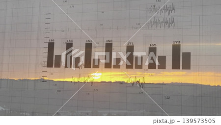 Displaying translucent data chart overlaying sunset through window glass, with bar labels 186-173 Displaying translucent data chart overlaying sunset through window glass, with bar labels 186-173 139573505