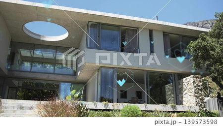 Displaying two-story concrete-glass house jutting over patio on slope, with skylight and blue icons 139573598