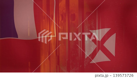 Displaying large red flag filling close-up frame, showing white X emblem and tricolor strip 139573726