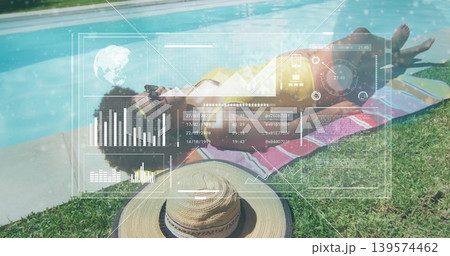Lying woman wearing yellow two-piece swimsuit at home poolside, straw hat and HUD overlay visible Lying woman wearing yellow two-piece swimsuit at home poolside, straw hat and HUD overlay visible 139574462