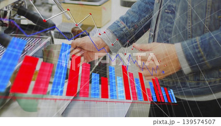 Holding male in blue denim jacket tapping payment card at cafe counter, with portafilter and charts 139574507
