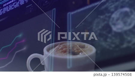 Framing white ceramic coffee cup sitting on dark desk, with neon line graphs and HUD overlays 139574508