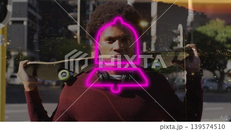 Posing man holding skateboard on shoulders on city street, with maroon sweater magenta bell overlay 139574510