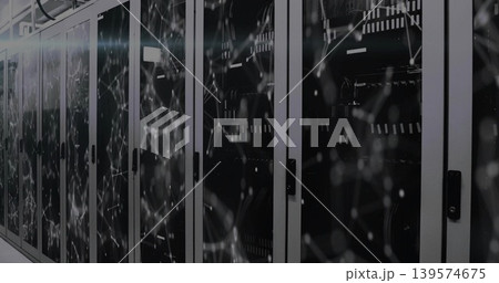 Glowing server cabinets showing glass doors, switches and cables in data center, showing overlay 139574675