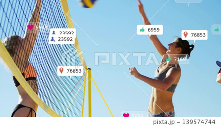 Spiking right-side player in gray sportswear on beach with volleyball, social icons, copy space Spiking right-side player in gray sportswear on beach with volleyball, social icons, copy space 139574744