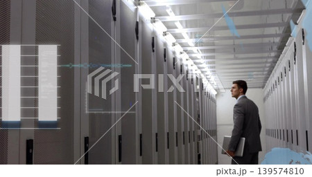 Walking man in suit holding laptop inspecting server rack LEDs in data center, copy space 139574810