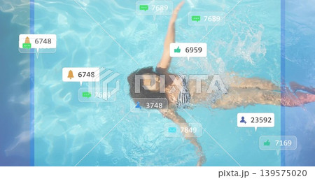 Floating woman in striped bikini, hair fanning, drifting in pool, with social notifications Floating woman in striped bikini, hair fanning, drifting in pool, with social notifications 139575020