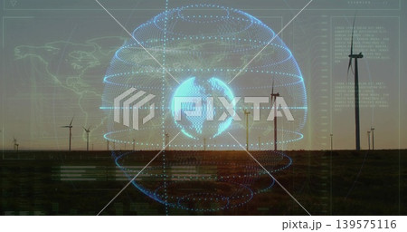 Displaying holographic blue globe overlaying wind farm at sunset, with turbines, HUD data panels 139575116