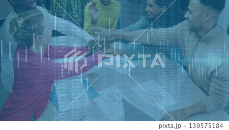 Leaning 5 colleagues stacking hands at glass table, in business attire with printed charts overlay 139575184