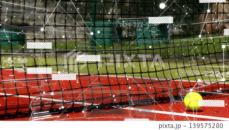 Sitting yellow tennis ball resting near net on red hard court, HUD overlay, copy space Sitting yellow tennis ball resting near net on red hard court, HUD overlay, copy space 139575280