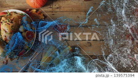 Showing roasted chicken sitting on platter left on wood table, citrus, overlay swirling, copy space 139575394