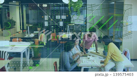 Collaborating designers in casual reviewing scale model and plans at coworking hub with AR overlay 139575403