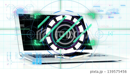 Displaying slim silver laptop projecting circular HUD overlay on white tabletop, with smartphone Displaying slim silver laptop projecting circular HUD overlay on white tabletop, with smartphone 139575456