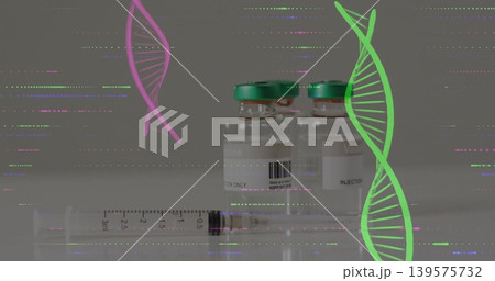 Showing two vaccine vials green caps, syringe resting on lab bench, pink green DNA glitch lines Showing two vaccine vials green caps, syringe resting on lab bench, pink green DNA glitch lines 139575732