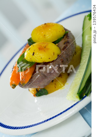Beef rissole with new potatoes and carrot 139576434