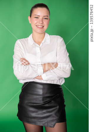 Smiling European girl in strict office clothes Smiling European girl in strict office clothes 139576452