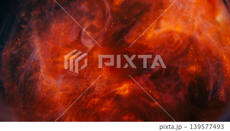 Smoke stream blur. Shimmering haze. Red orange brown ink fume explosion in liquid. Sparkling swirl blending on color abstract background. 139577493