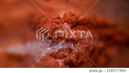 Paint twirl. Blur color water. Defocused orange purple sparkling texture glitter fog liquid spreading on abstract creative art background. Paint twirl. Blur color water. Defocused orange purple sparkling texture glitter fog liquid spreading on abstract creative art background. 139577494
