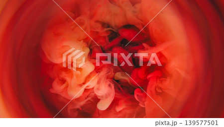 Blur cloud blend. Bright ink background. Defocused yellow orange color twirl glitter liquid circle floating on creative abstraction. Blur cloud blend. Bright ink background. Defocused yellow orange color twirl glitter liquid circle floating on creative abstraction. 139577501