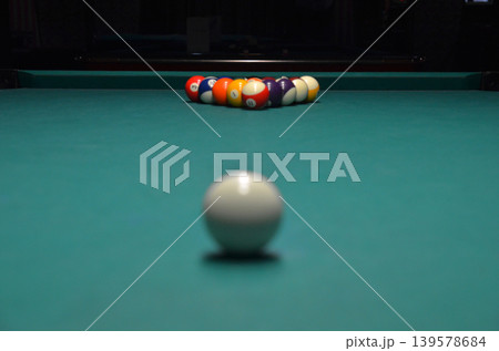 Billiard balls racked on a pool table Billiard balls racked on a pool table 139578684