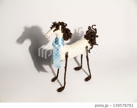 Handmade toy horse on white background Handmade toy horse on white background 139578781