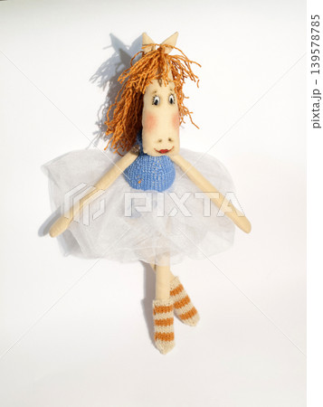 Handmade fabric horse doll on white background Handmade fabric horse doll on white background 139578785