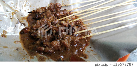Traditional Indonesian chicken satay with peanut sauce. Traditional Indonesian chicken satay with peanut sauce. 139578797