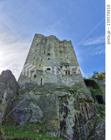 Ancient stone tower on rocky hillside Ancient stone tower on rocky hillside 139578818