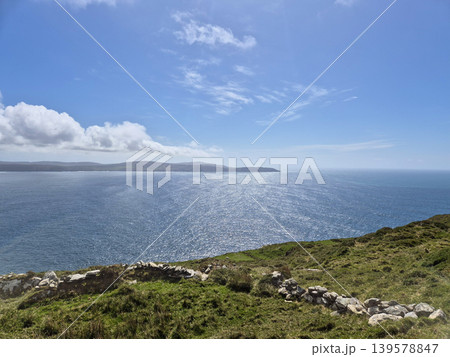 Sunny coastal landscape with ocean and distant horizon Sunny coastal landscape with ocean and distant horizon 139578847