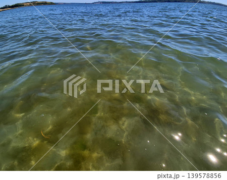 Clear shallow seawater with gentle ripples Clear shallow seawater with gentle ripples 139578856