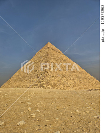 Ancient stone pyramid under clear blue sky 139578962