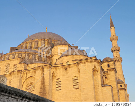 Historic mosque with dome and minaret at sunset Historic mosque with dome and minaret at sunset 139579054