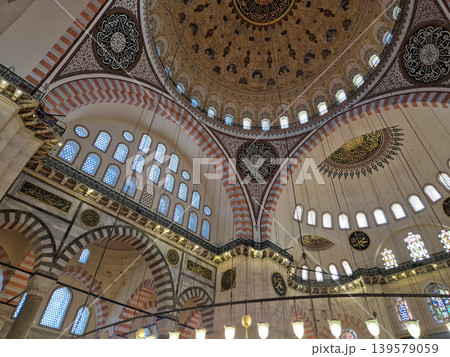 Ornate mosque interior with domed ceiling and arches Ornate mosque interior with domed ceiling and arches 139579059