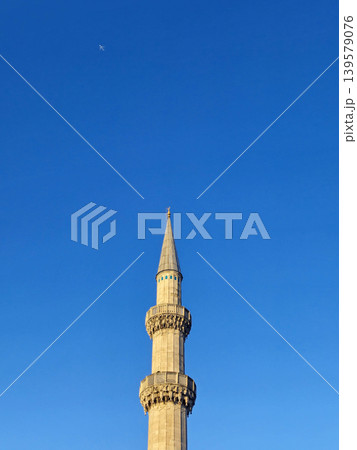 Single minaret against clear blue sky Single minaret against clear blue sky 139579076