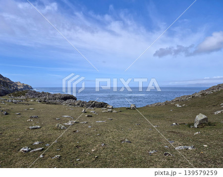Rocky coastal landscape with ocean and blue sky Rocky coastal landscape with ocean and blue sky 139579259